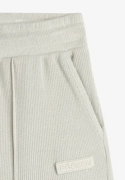 Freddy Pantaloni comfort fit da donna in tessuto jersey waffle-Donna Pantaloni Sportivi|Tutti I Pantaloni