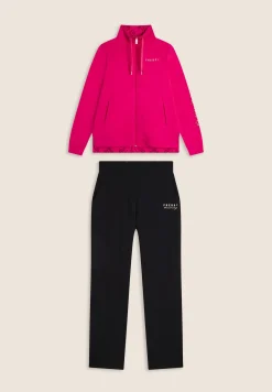 Freddy Tuta donna con zip, collo alto e spacchi laterali su fondo gamba-Donna Tute