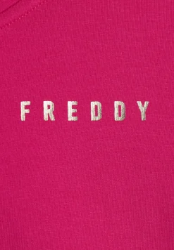 Freddy Tuta donna con zip, collo alto e spacchi laterali su fondo gamba-Donna Tute